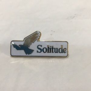 “Solitude” pin with dove in flight